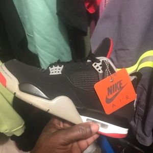 Shoes black and red Jordan’s 4